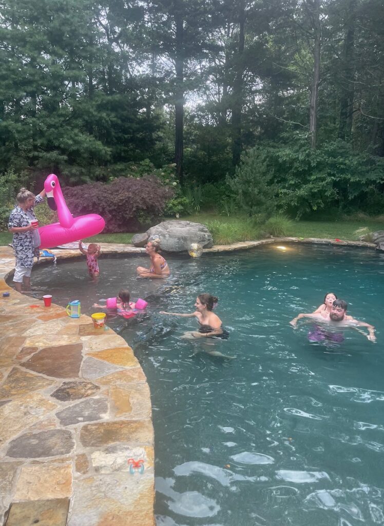 rainy pool day family in pool sag harbor north haven new york the hamptons